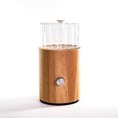 Wooden and glass humidifier on a white background