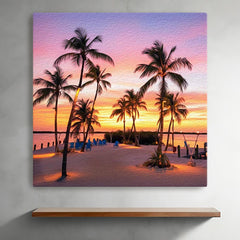 Canvas print of a tropical beach scene with palm trees and a sunset.